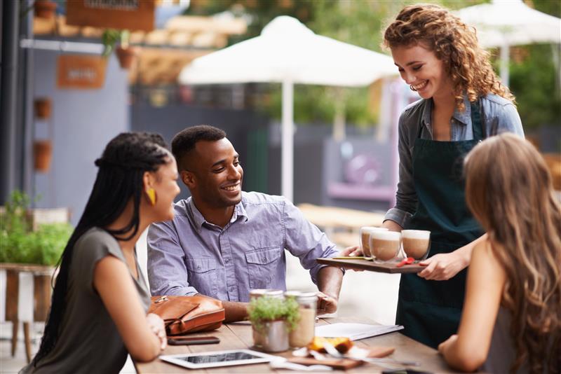 people chatting around a table 