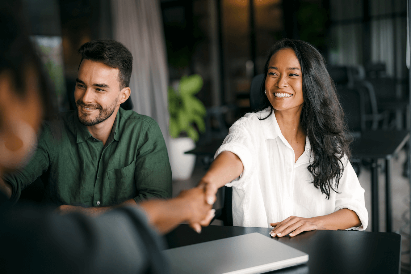 two people shaking hands