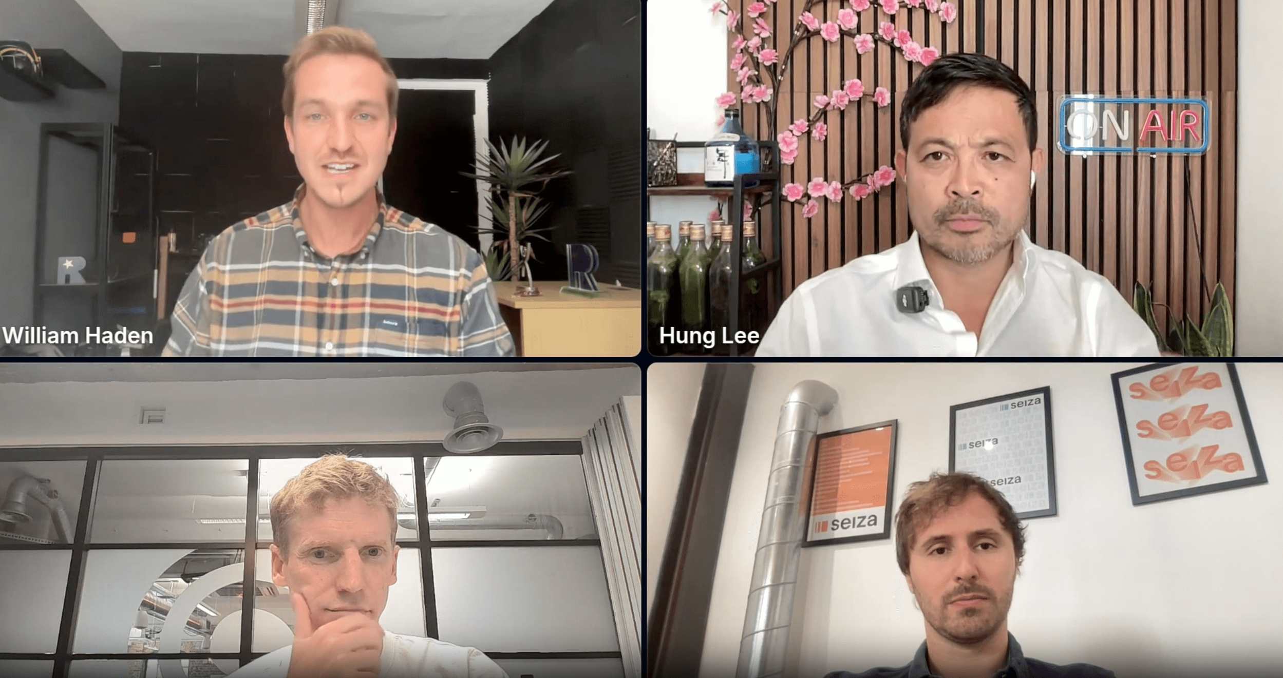 Zoom call of four men.